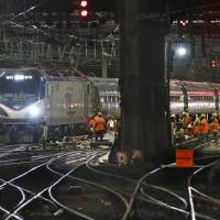 Amtrak workers continue ongoing infrastructure renewal work beneath Penn Station in New York last July. President Donald Trump on Monday unveiled his long-awaited infrastructure plan, a &#36;1.5 billion proposal that fulfills a number of campaign goals, but relies heavily on state and local governments to produce much of the funding. | AP