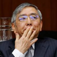 Bank of Japan Gov. Haruhiko Kuroda attends a financial and monetary committee on Feb. 16. His reappointment and the assignment of a new vice governor has prompted many companies to issue superlong bonds. | REUTERS