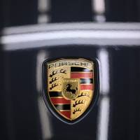 The Japanese subsidiary of German luxury automaker Porsche says it has detected multiple cyberattacks that resulted in over 28,700 customer email addresses being stolen. | BLOOMBERG