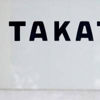 The logo of Takata Corp. is seen on its display at a showroom for vehicles in Tokyo last year. | REUTERS