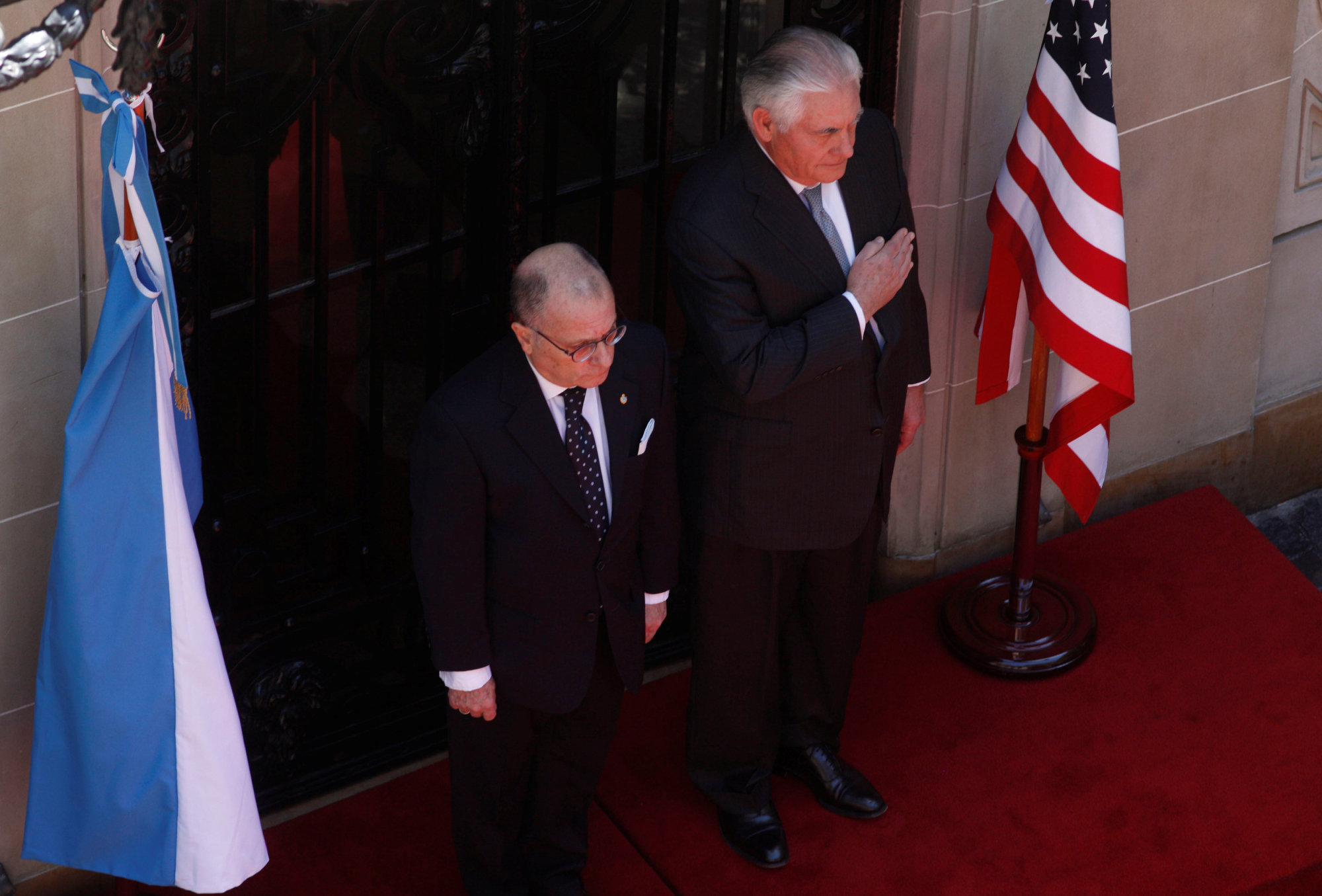 U.S. Secretary of State Rex Tillerson pays homage to Argentine hero Jose de San Martin alongside Argentine Foreign Minister Jorge Faurie at San Martin Palace in Buenos Aires Sunday. | REUTERS