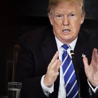U.S. President Donald Trump speaks during an infrastructure initiative meeting in the White House on Monday. | BLOOMBERG