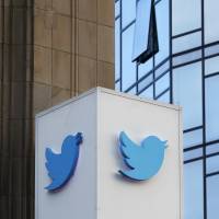 The Twitter sign is seen outside of the company\'s headquarters in San Francisco in 2016. A white nationalist advocate is suing Twitter for banning his account amid the company\'s recent crackdown on content it deems abusive. Jared Taylor filed the lawsuit Tuesday in a San Francisco state court. Taylor joins a growing list of extreme right wing groups and figures suing social media sites for banning their accounts and content. | AP