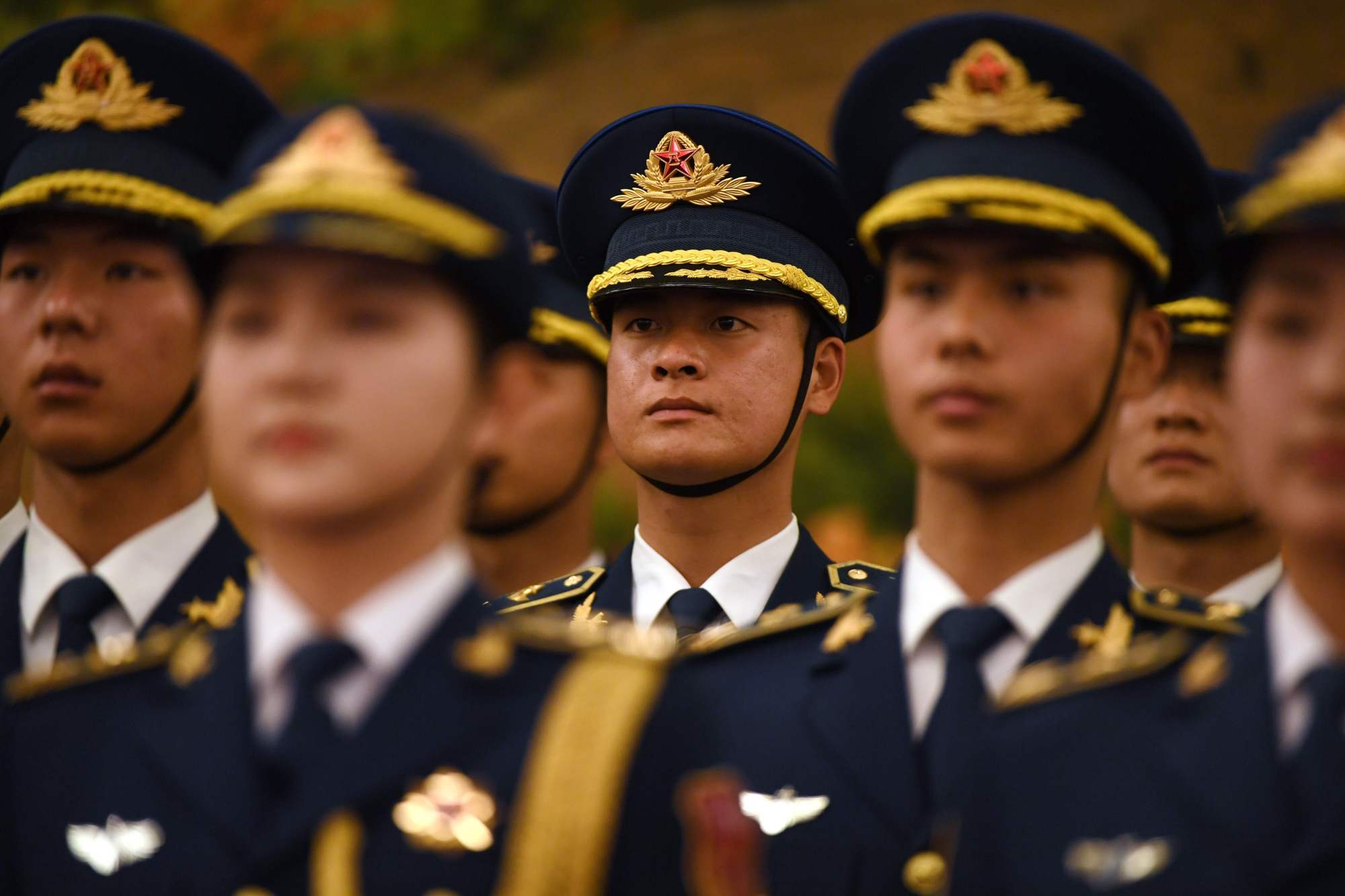 Members of a military honor guard rehearse ahead of a welcome ceremony for British Prime Minister Theresa May in Beijing's Great Hall of the People on Jan. 31. | AFP-JIJI