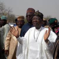 Information Minister Lai Mohammed speaks during his visit Thursday to the school in Dapchi, Nigeria, in the northeastern state of Yobe where dozens of school girls went missing after an attack on the village by Boko Haram. | REUTERS