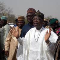 Information Minister Lai Mohammed speaks during his visit Thursday to the school in Dapchi, Nigeria, in the northeastern state of Yobe where dozens of school girls went missing after an attack on the village by Boko Haram. | REUTERS