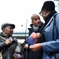 Opposition Labour lawmaker Chuka Umunna campaigns, along with pro-European activists, on the streets of Brixton, south London, on Friday, | AFP-JIJI