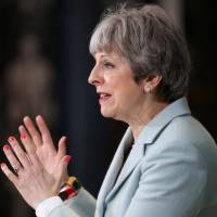British Prime Minister Theresa May delivers a speech to students and staff during her visit to Derby College in Derby, Britain, on Monday. | POOL / VIA REUTERS