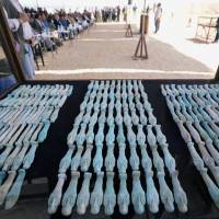 Statues discovered near an ancient necropolis in Minya, Egypt, are shown on Saturday. | REUTERS