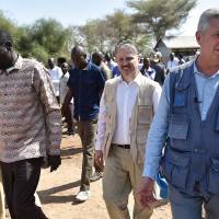 United Nations High Commissioner for Refugees (UNHCR) Filippo Grandi (right) and Turkana county Gov. Josphat Nanok (left) walk during a visit with recently arrived refugees from South Sudan on Thursday at the Kakuma refugee complex. Filippo Grandi, and the Emergency Relief Coordinator, Mark Lowcock, launched a funding appeal to support refugees fleeing the worsening humanitarian situation in South Sudan as well as multitudes of the internally displaced now facing desperate conditions in the conflict now in its fifth year. | AFP-JIJI