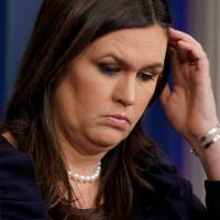 White House Press Secretary Sarah Huckabee Sanders speaks during a news briefing at the White House in Washington Monday. | REUTERS