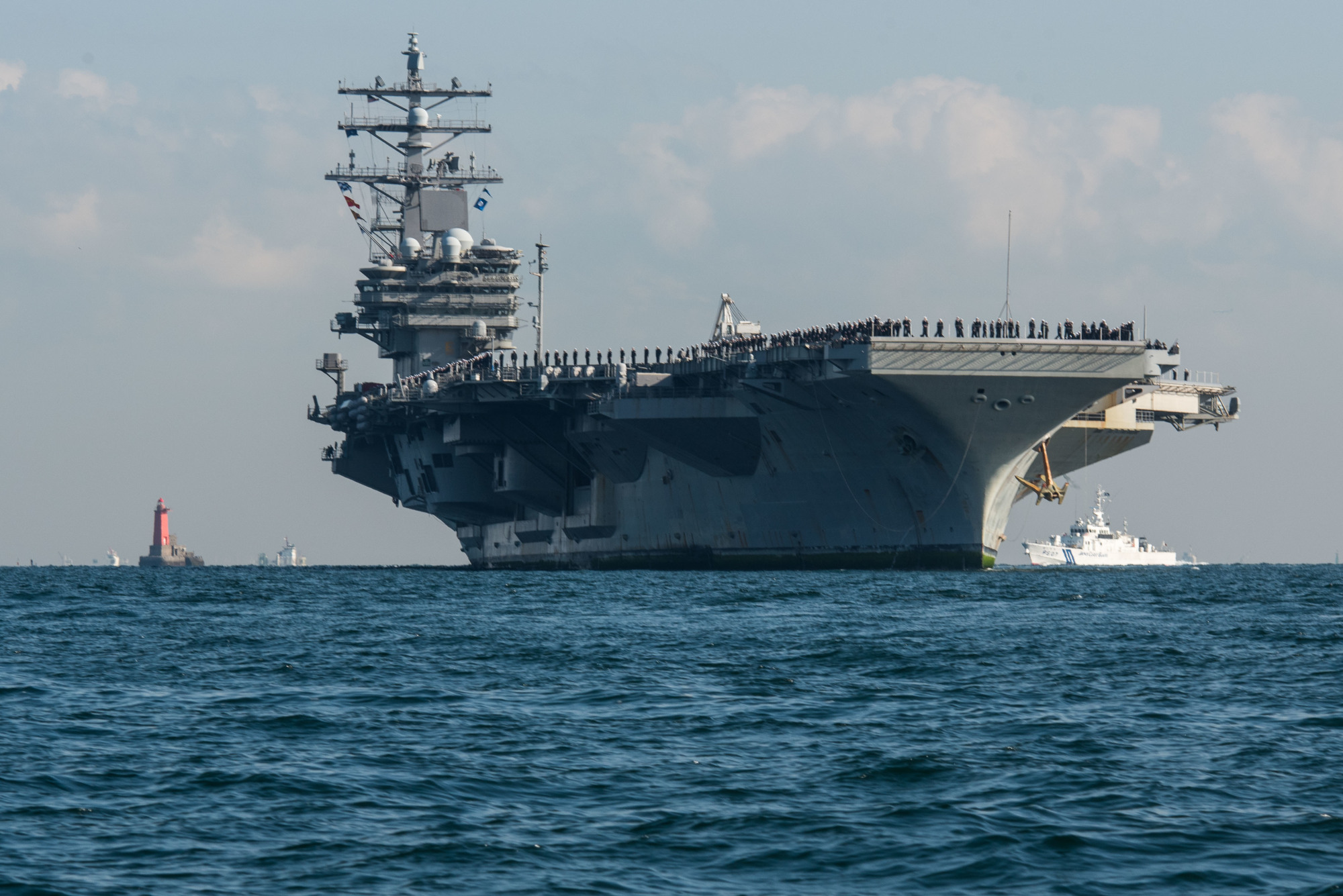 The USS Ronald Reagan arrives at Yokosuka Naval Base in December after a scheduled patrol. | NAVY MEDIA CONTENT SERVICES