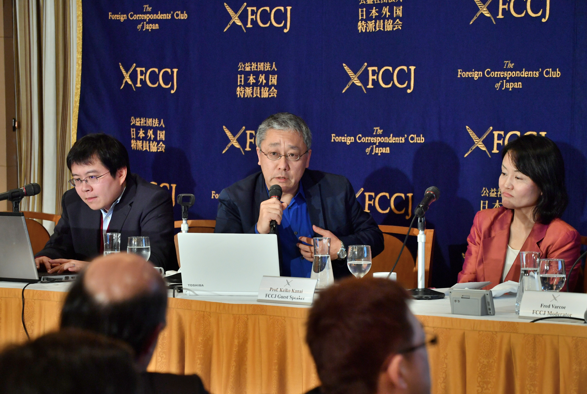 FactCheck Initiative Japan co-founder Yoichiro Tateiwa (center) speaks at a news conference in Tokyo on Feb. 8, as FIJ representatives Hitofumi Yanai (left) and Keiko Kanai look on. | YOSHIAKI MIURA