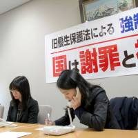 A lawyer at the Sendai Bar Association office on Friday takes notes while talking to people affected by the now-defunct Eugenic Protection Law. | KYODO