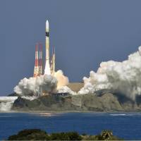 An H-IIA F38 rocket is launched Tuesday from a Japan Aerospace Exploration Agency facility in Kagoshima Prefecture. | KYODO