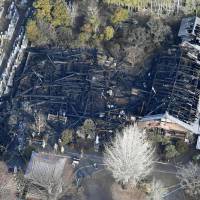 An aerial photo taken Friday shows the gutted main building and priests\' quarters of Jomanji Temple in Inuyama, Aichi Prefecture. | KYODO
