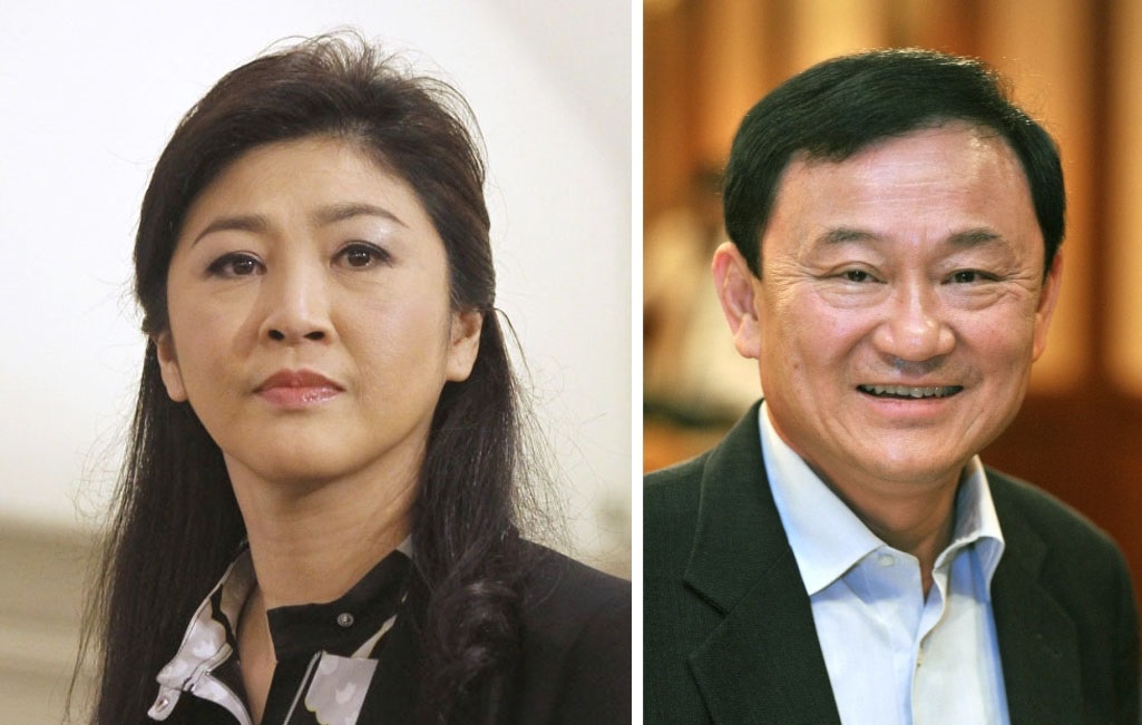 Yingluck Shinawatra (left) and her brother Thaksin Shinawatra | REUTERS