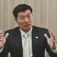 Lobsang Sangay, president of the Tibetan government-in-exile, is interviewed in Tokyo on Feb. 20 during a weeklong visit to Japan. | YOSHIAKI MIURA