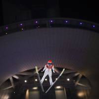 Yuki Ito of Japan competes in the women\'s normal hill ski jump event.  | REUTERS
