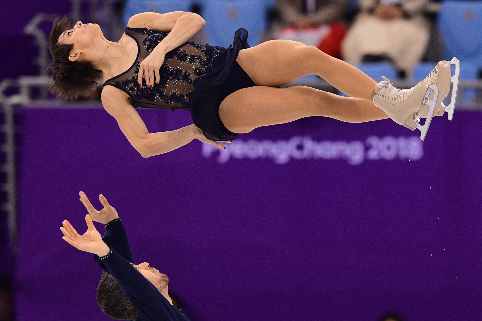 Canada's Meagan Duhamel and Eric Radford compete in the pair skating short program of the figure skating event. | AFP-JIJI