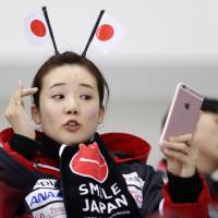 A fan takes a selfie before the Sweden v Japan  women\'s hockey classification match. | REUTERS
