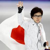Nao Kodaira of Japan celebrates after winning a gold medal in the 500m women\'s speed skating final. | REUTERS