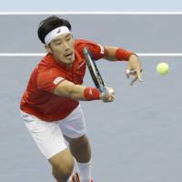 Japan\'s Yuichi Sugita plays a shot during his Davis Cup singles match against Italy\'s Fabio Fognini in Morioka on Sunday. | KYODO