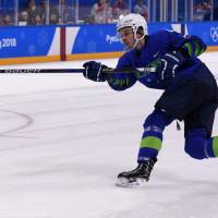 Slovenia\'s Ziga Jeglic, seen scoring the game-winning goal against Slovakia in a penalty shootout last week, became the third Olympic athlete to fail a doping test in South Korea, the Court of Arbitration for Sport said on Tuesday. | AFP-JIJI