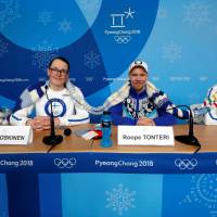 Members of the Finland Olympic team attend a Wednesday news conference regarding their knitting project in Pyeongchang, South Korea. | REUTERS