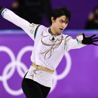 Two-time Olympic champion Yuzuru Hanyu’s intense mental focus, amazing physical gifts and huge popularity resonate with skating observers around the world. | AFP-JIJI