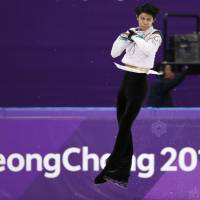 Yuzuru Hanyu competes in the men\'s Olympic figure skating competition on Saturday. | REUTERS