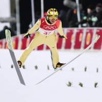 Noriaki Kasai competes in the qualifying round of the men\'s normal hill jump on Thursday at the  Alpensia Ski Jumping Centre. | KYODO