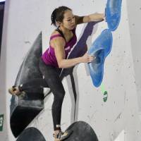 Veteran boulderer Akiyo Noguchi competes during the Bouldering Japan Cup women\'s finals on Sunday at Komazawa Olympic Park. | KAZ NAGATSUKA