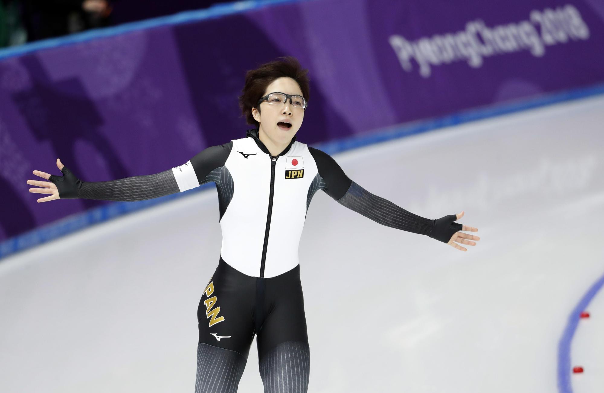 Nao Kodaira reacts after setting an Olympic record time of 36.94 seconds in the women's 500 meters at Gangneung Oval on Sunday night. Kodaira claimed the gold medal. | REUTERS