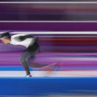 Ryosuke Tsuchiya of Japan competes Sunday in the 5,000-meter speedskating event at the Pyeongchang Games in South Korea. | REUTERS