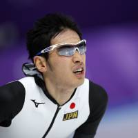 Japan\'s Ryosuke Tsuchiya catches his breath after the men\'s 5,000 meters race at the Gangneung Oval at the 2018 Winter Olympics in Gangneung, South Korea, Sunday. | AP