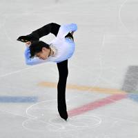 Yuzuru Hanyu on his way to the top of the men\'s single skating short program of the figure skating event on Friday.  | AFP-JIJI