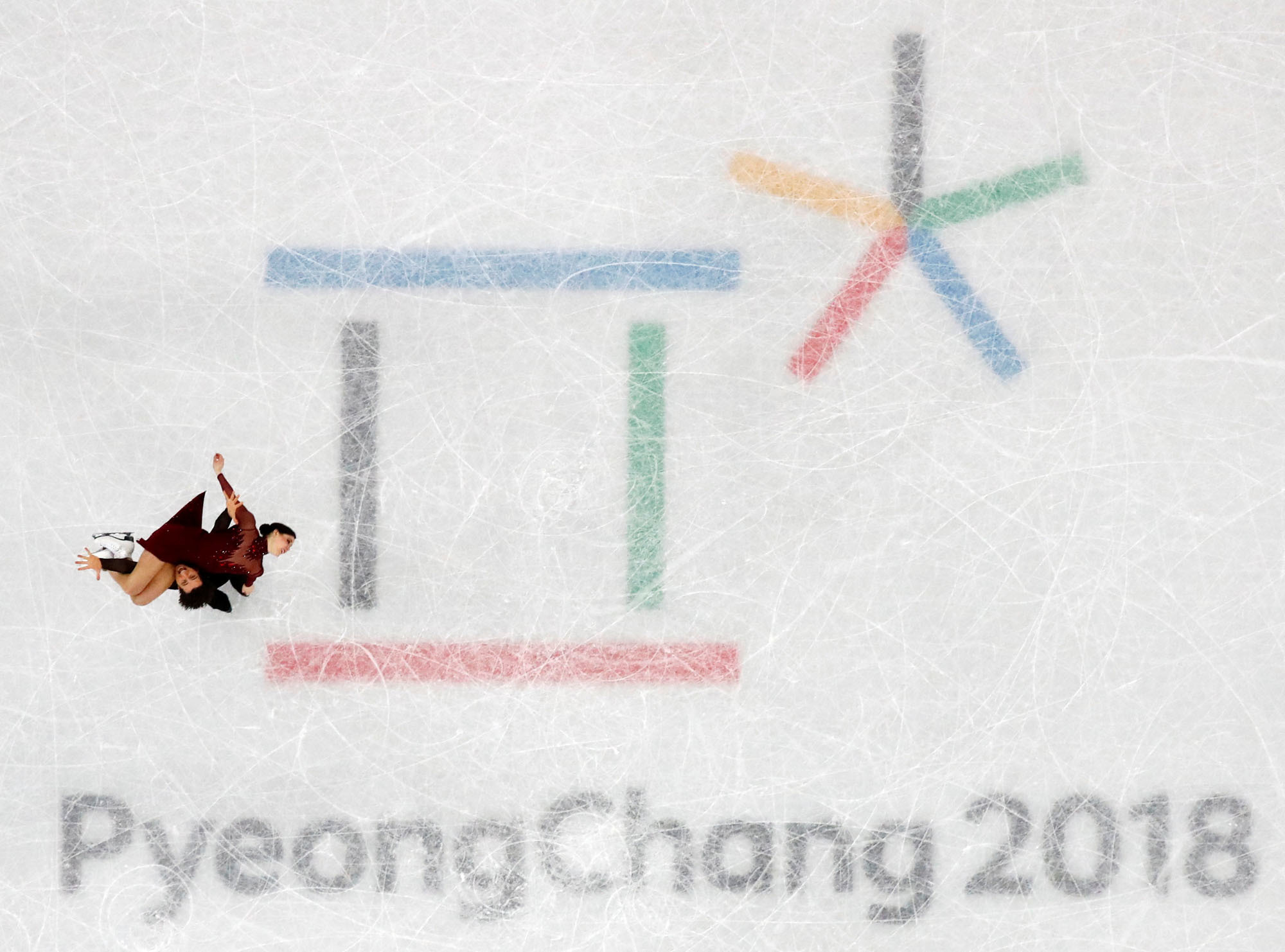 Canadians Tessa Virtue and Scott Moir perform their free dance during the ice dance competition on Tuesday in Gangneung, South Korea. The pair won the gold medal with a world record total score of 206.07 on another busy day at the Pyeongchang Games. | REUTERS