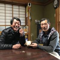 Rice farmers Hiroyuki Abe (left) and Katsuyoshi Abe. | MAIKO MURAOKA