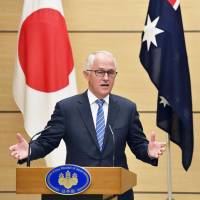 Prime Minister Shinzo Abe and Australian Prime Minister Malcolm Turnbull hold a news conference in January in Tokyo. | KYODO