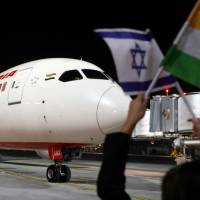 A Boeing 787 flight number AI139 of Indian national carrier Air India, from New Delhi, arries on the tarmac at Ben Gurion International Airport on the outskirts of Tel Aviv on Thursday after using for the first time Saudi airspace. | AFP-JIJI