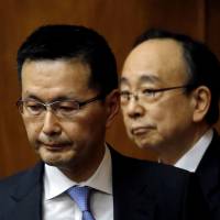 Masazumi Wakatabe (left) and Masayoshi Amamiya, government nominees to become the next Bank of Japan deputy governors, attend a confirmation hearing in the Lower House on Monday. | REUTERS