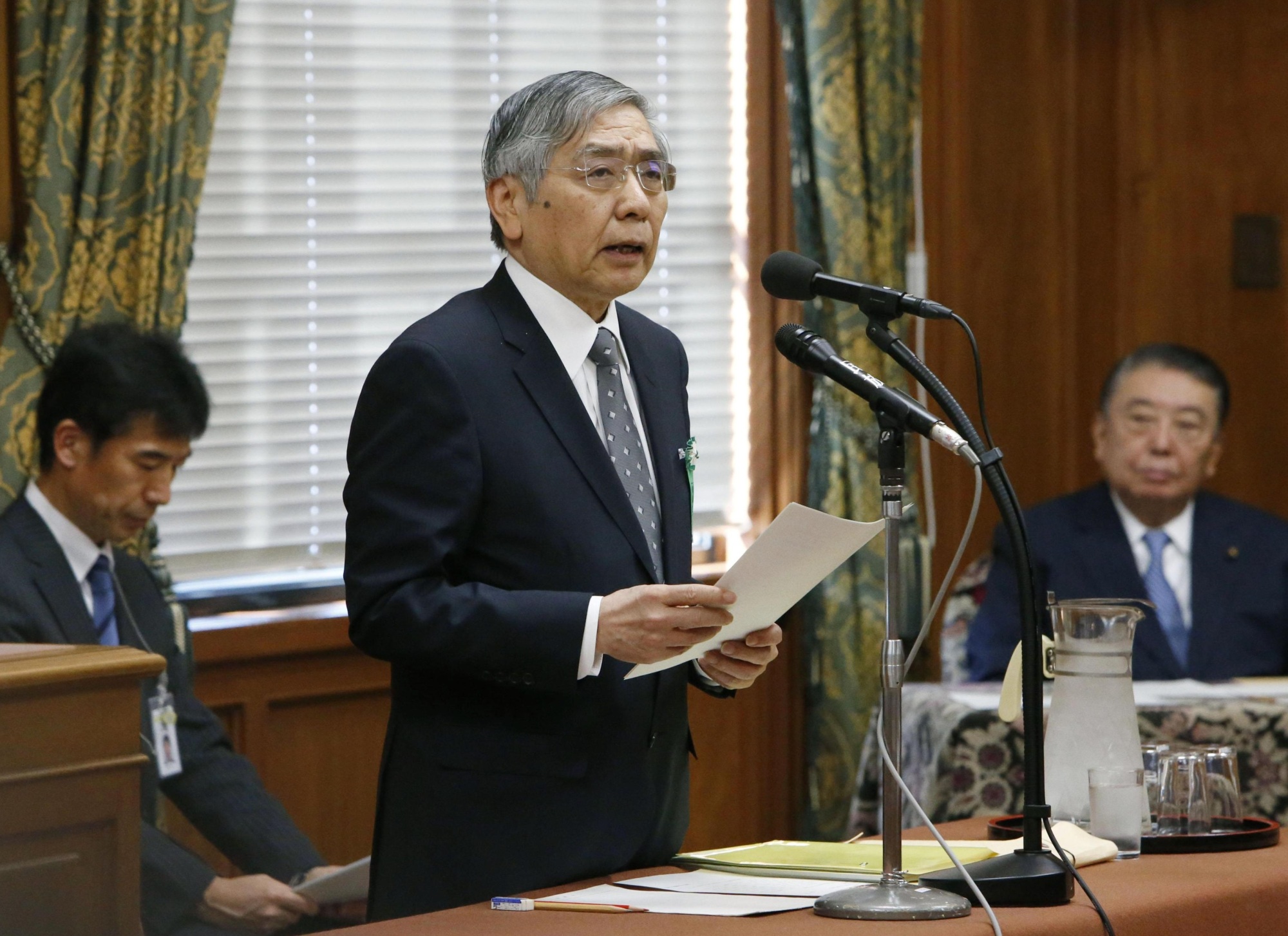 Bank of Japan Gov. Haruhiko Kuroda speaks at a Lower House committee Friday. | KYODO