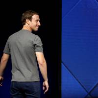 Facebook Founder and CEO Mark Zuckerberg exits the stage during the annual Facebook F8 developers conference in San Jose, California, last April. | REUTERS