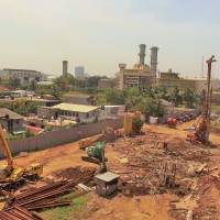 Construction work for a pumping station on the banks of the Kelani River to remove floodwater from Colombo is seen on Feb. 22. | THOMSON REUTERS FOUNDATION / AMANTHA PERERA