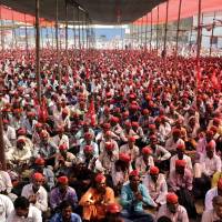 Thousands of farmers listen to their leader at the end of their six-day march on foot, in Mumbai Monda. Tens of thousands of farmers from across western India have arrived in Mumbai demanding, among other things, a waiver of farm loans and fair prices for their produce as India\'s agriculture sector struggles amid years of declining earnings. | AP