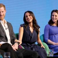 Britain\'s Catherine, Duchess of Cambridge, and Prince Harry and his fiancee, Meghan Markle (center), attend the first annual Royal Foundation Forum held at Aviva in London Wednesday. | REUTERS