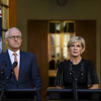 Australian Prime Minister Malcolm Turnbull and Foreign Minister Julie Bishop speak to the media during a Tuesday news conference at Parliament House, Canberra. | REUTERS