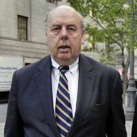 Attorney John Dowd walks in New York in 2011. One of President Donald Trump\'s attorneys floated the possibility of pardoning two of the president\'s former advisers caught up in the Russia probe in discussions with their lawyers last year, The New York Times reported Wednesday. The newspaper, citing three anonymous people with knowledge of the discussions, says that then-Trump attorney, John Dowd, raised the idea with attorneys for former Trump campaign chairman Paul Manafort and former national security adviser Michael Flynn. | AP