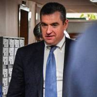 A picture taken on March 24, 2017, shows Leonid Slutsky, head of the State Duma\'s foreign affairs committee, walking along a hall of the Russian State Duma building. | AFP-JIJI
